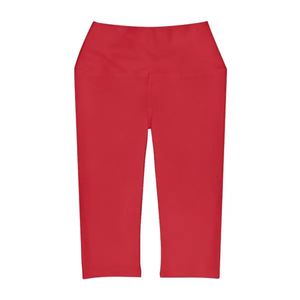 Red capri pants on white background.