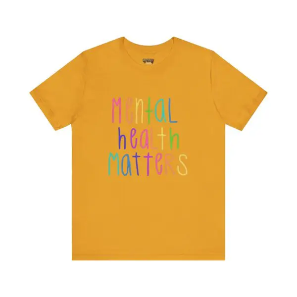 Yellow t-shirt with "Mental Health Matters" text.