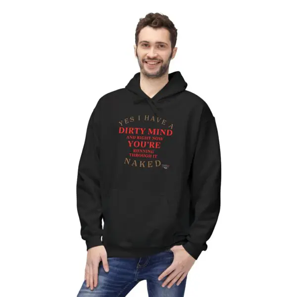 Man wearing a black hoodie, smiling.