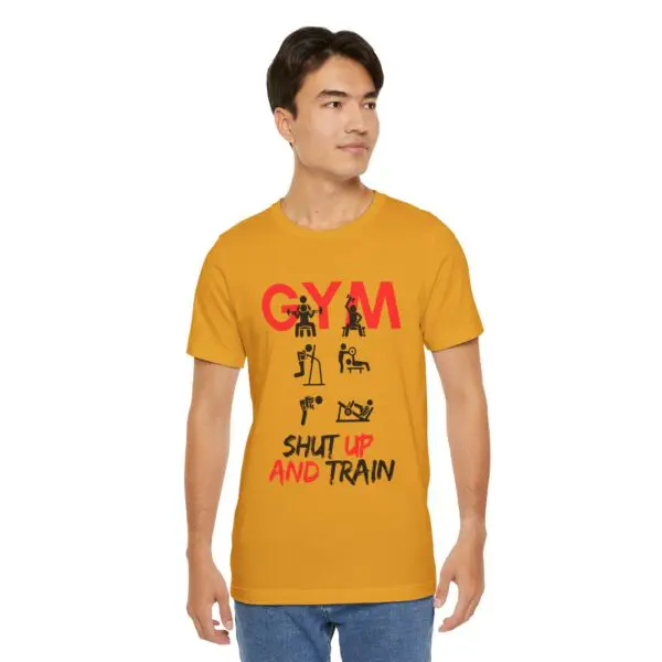 Man wearing "Shut Up and Train" T-shirt.