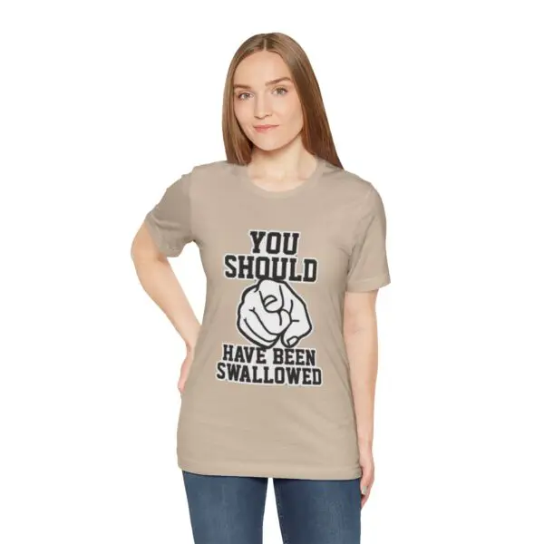Woman wearing a humorous graphic t-shirt.