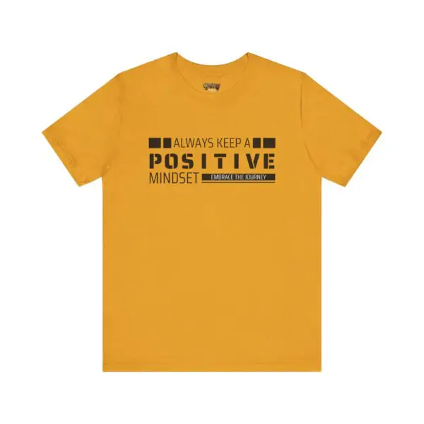 Yellow t-shirt with motivational text design.