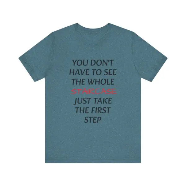 Blue T-shirt with motivational quote design.