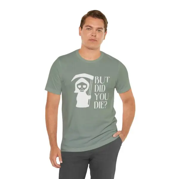 Man wearing "But Did You Die?" shirt.