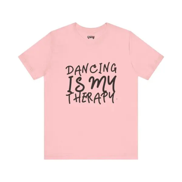 Pink shirt with "Dancing Is My Therapy" text.