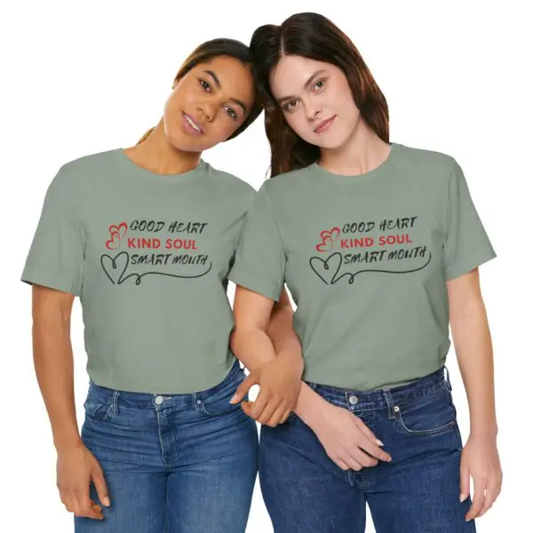 Two women wearing matching graphic T-shirts.