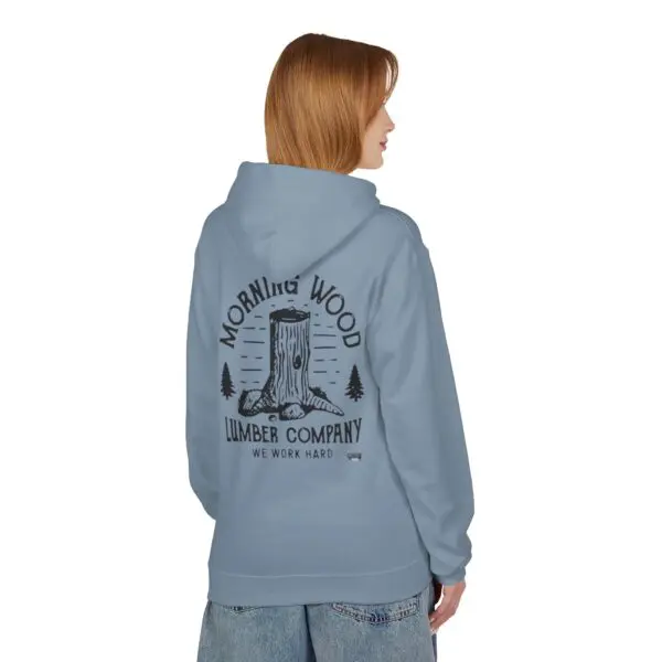 Person wearing blue hoodie with tree design.