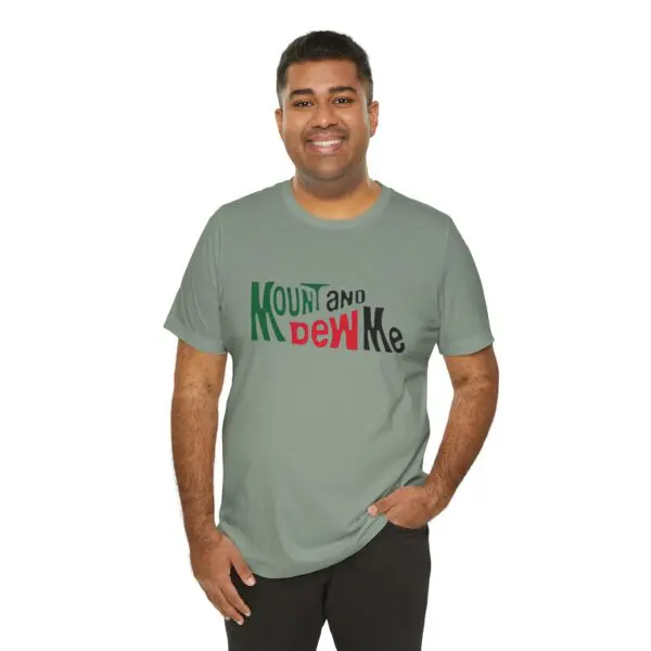 Man wearing a graphic T-shirt smiling.
