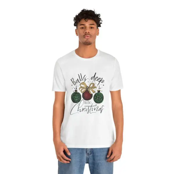 Man wearing Christmas-themed graphic t-shirt.