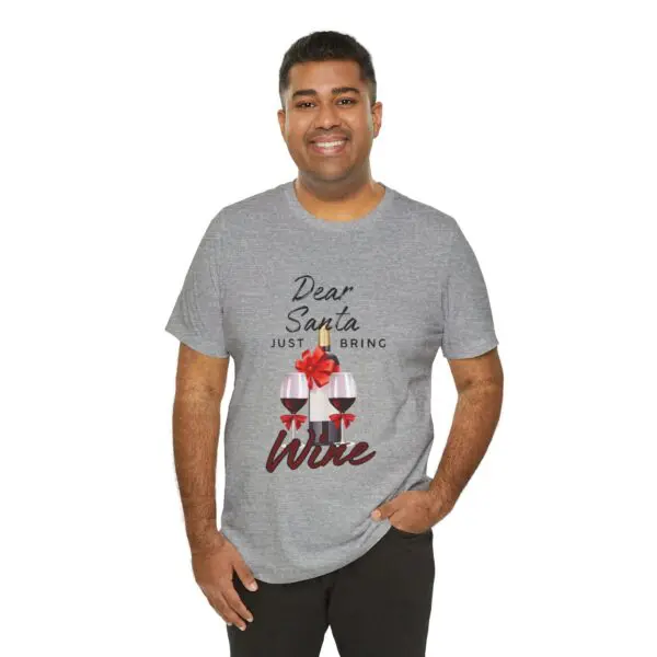 Man wearing "Dear Santa, bring wine" shirt.