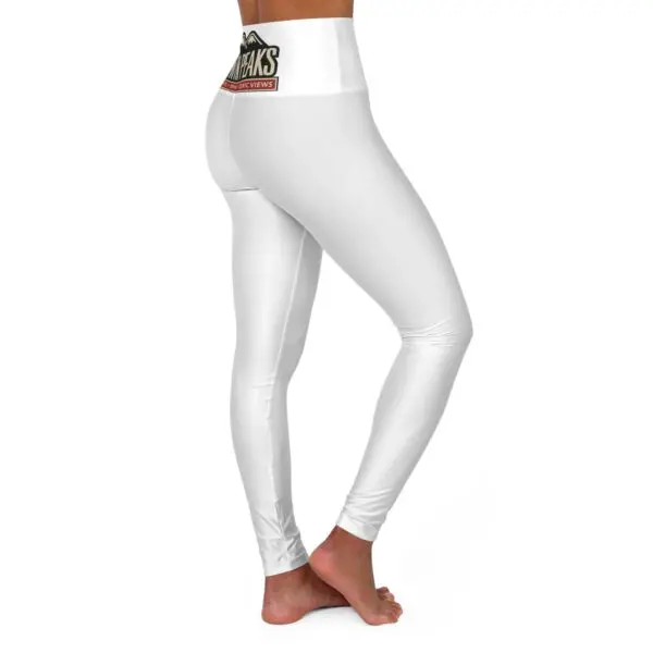 White leggings with mountain logo design.