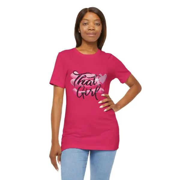 Woman in pink "That Girl" shirt.