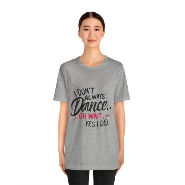 Woman wearing a "Dance" graphic t-shirt.