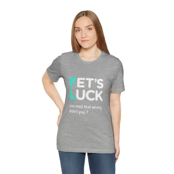 Woman wearing a humorous gray t-shirt.