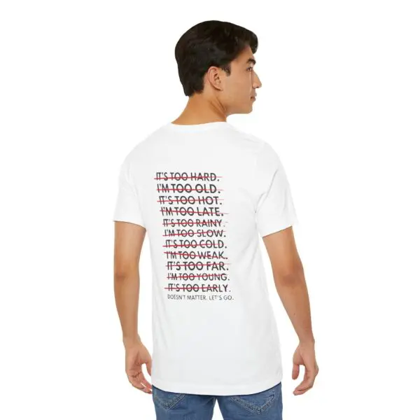 Man wearing a motivational graphic t-shirt.