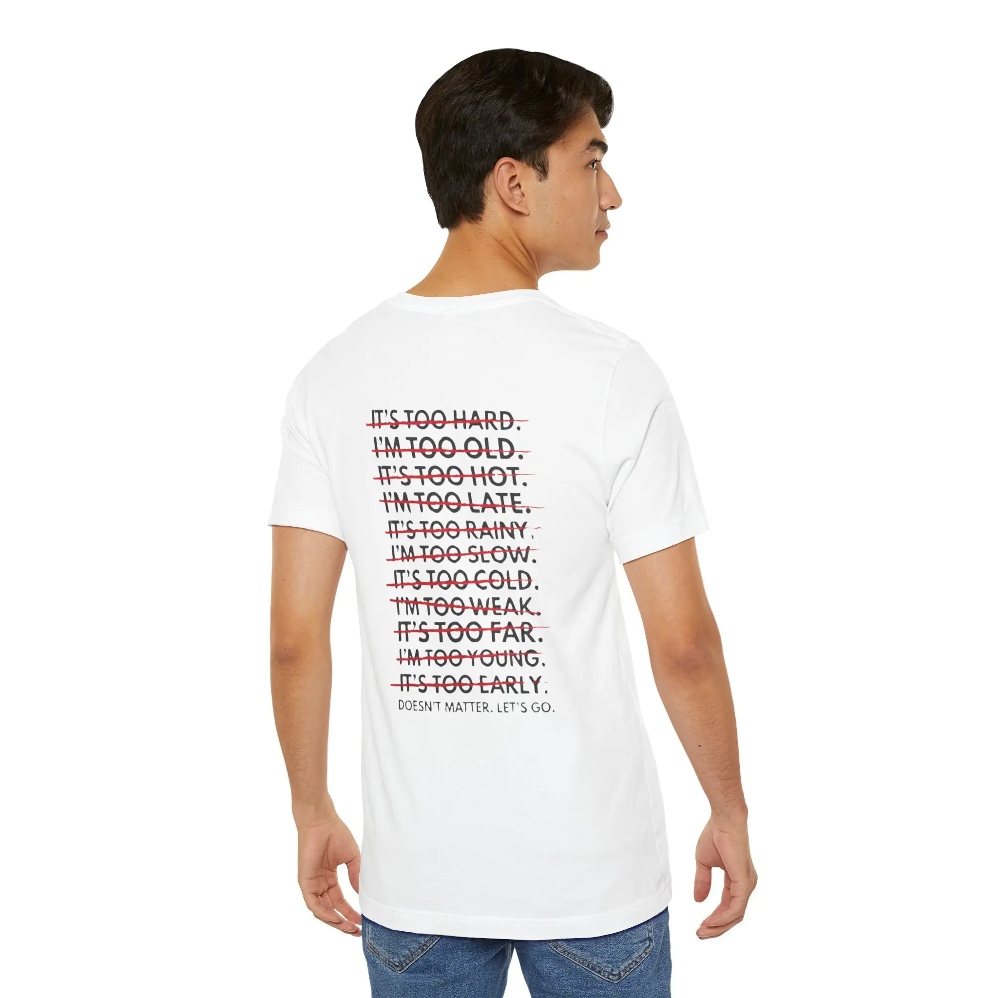 Man wearing a motivational graphic t-shirt.
