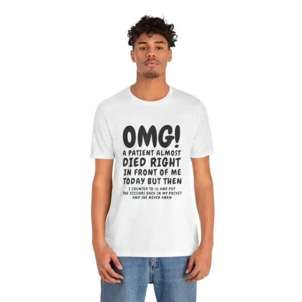 Man wearing humorous medical-themed t-shirt.