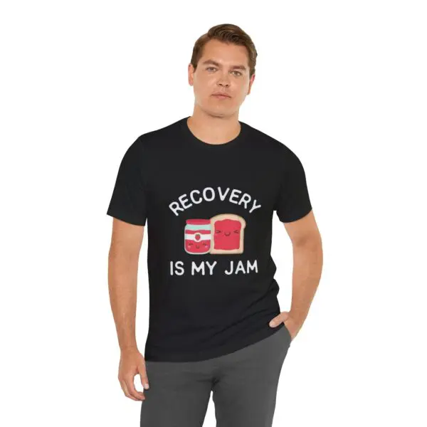 Man wearing "Recovery is My Jam" shirt.