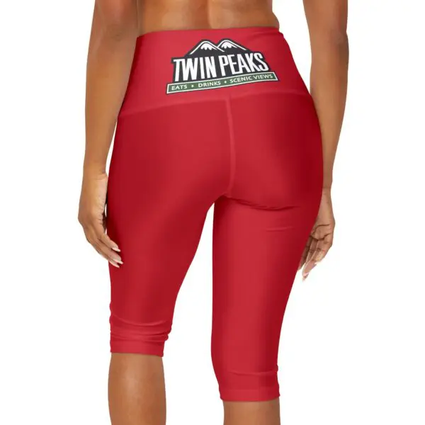 Woman wearing red "Twin Peaks" leggings.