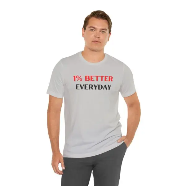 Man wearing "1% Better Everyday" shirt.
