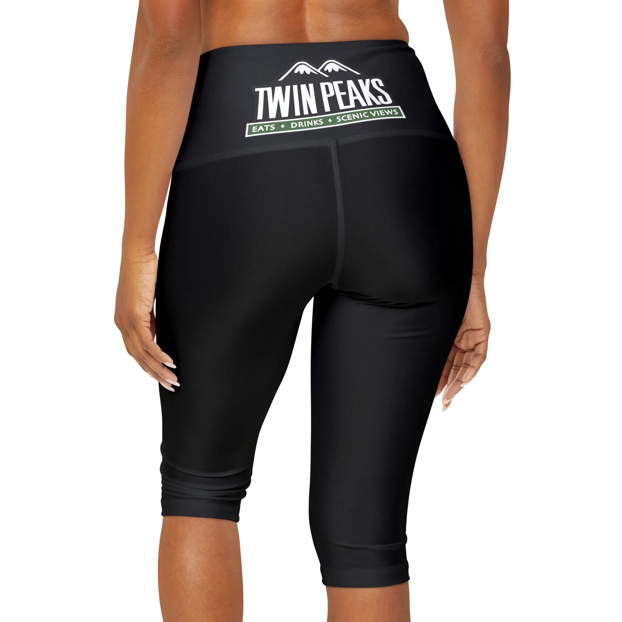 Woman wearing black Twin Peaks leggings.