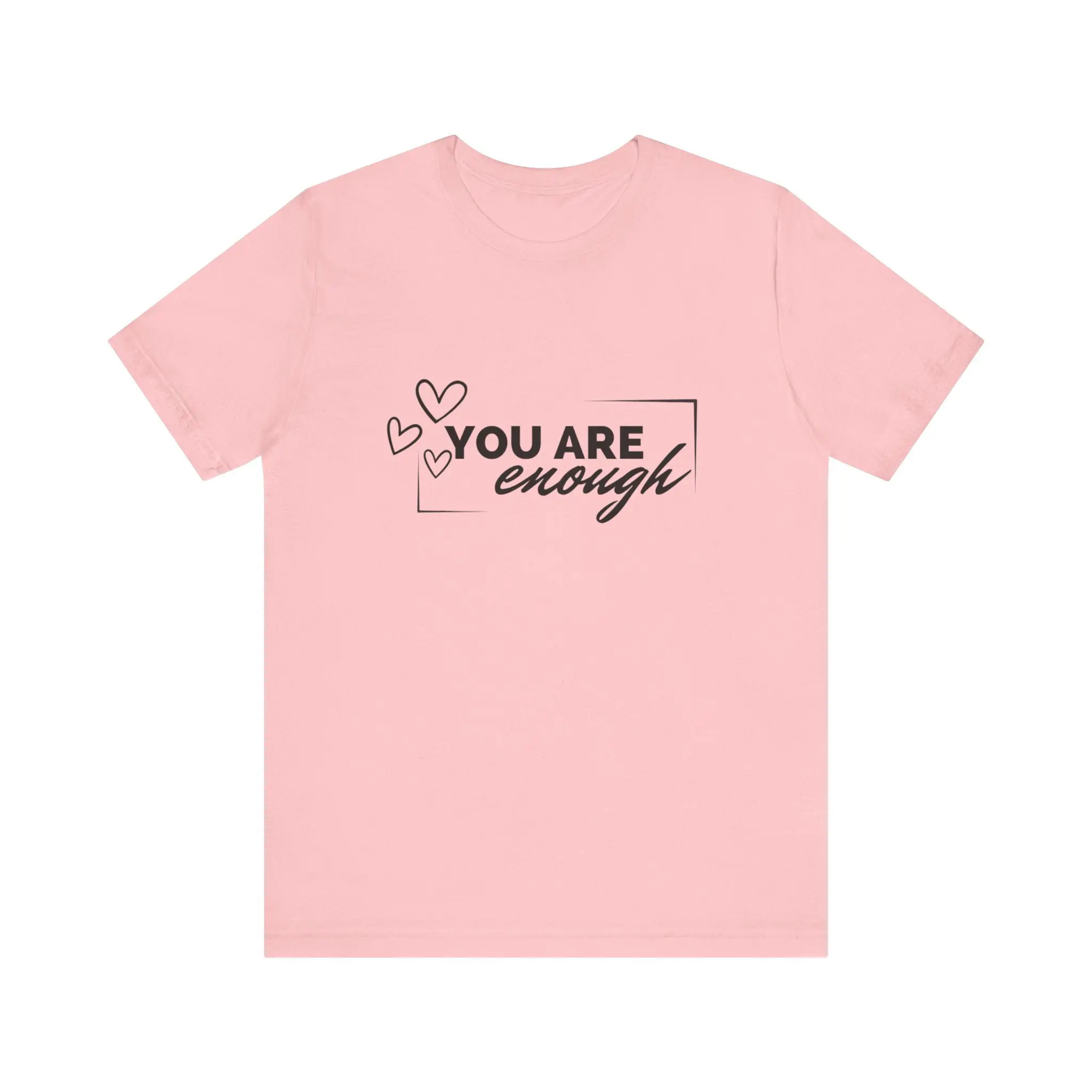 Pink shirt with "You Are Enough" text.