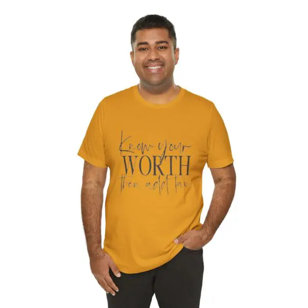 Man wearing a yellow inspirational t-shirt.