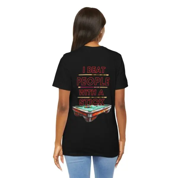 Woman wearing T-shirt with humorous text.