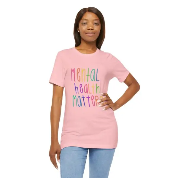 Woman wearing "Mental Health Matters" t-shirt.