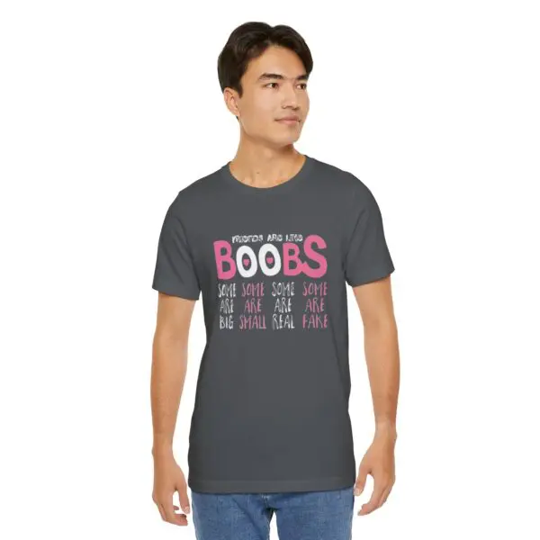 Man wearing humorous graphic t-shirt.