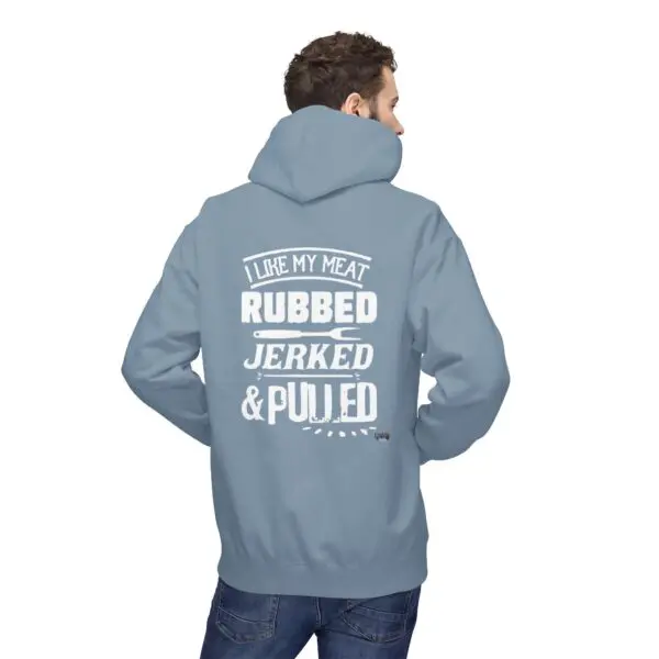 Man wearing hoodie with humorous meat text.