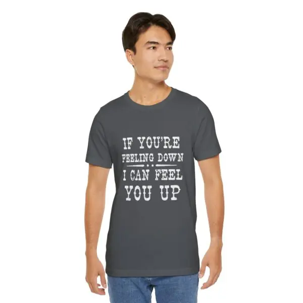 Man wearing shirt with motivational text.