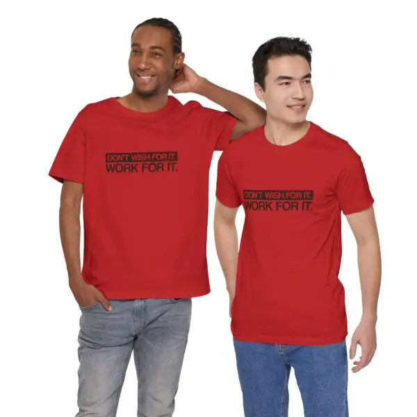 Two men wearing matching motivational red shirts.