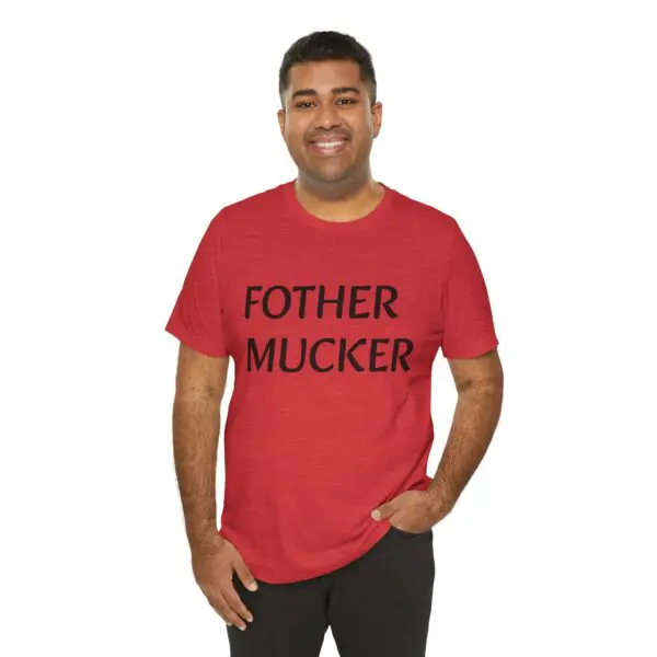 Man in red shirt with black text.