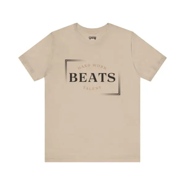 Beige T-shirt with motivational text design.