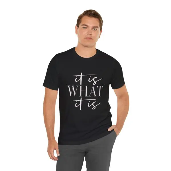 Man wearing "It Is What It Is" shirt.