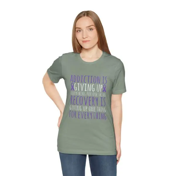 Woman wearing a motivational quote t-shirt.