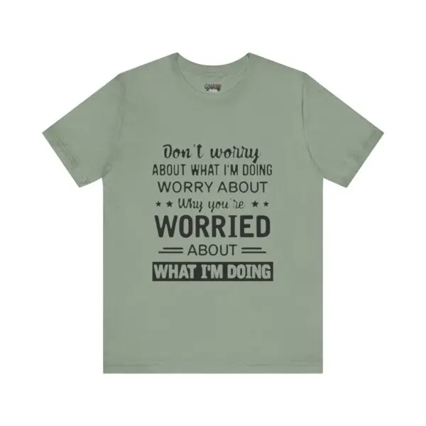 Green T-shirt with humorous black text design.