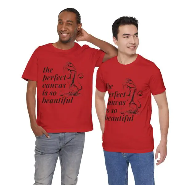 Two men wearing matching red graphic shirts.