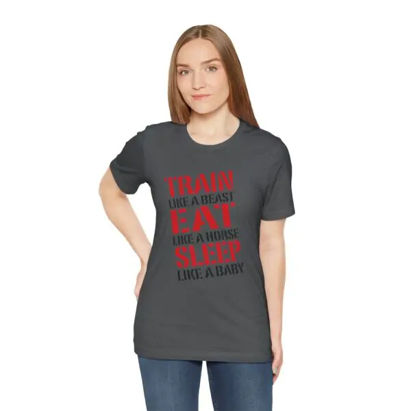 Woman wearing motivational text t-shirt.