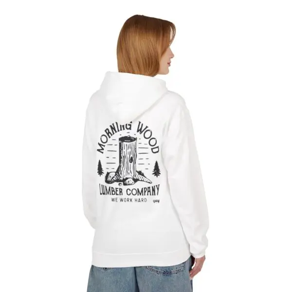 Woman in hoodie with lumber company design.
