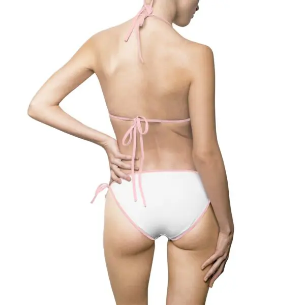 Woman in bikini facing away from camera.