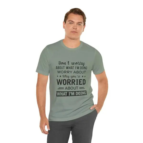 Man wearing a shirt with humorous text.