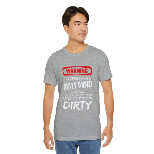 Man wearing shirt with humorous warning text.