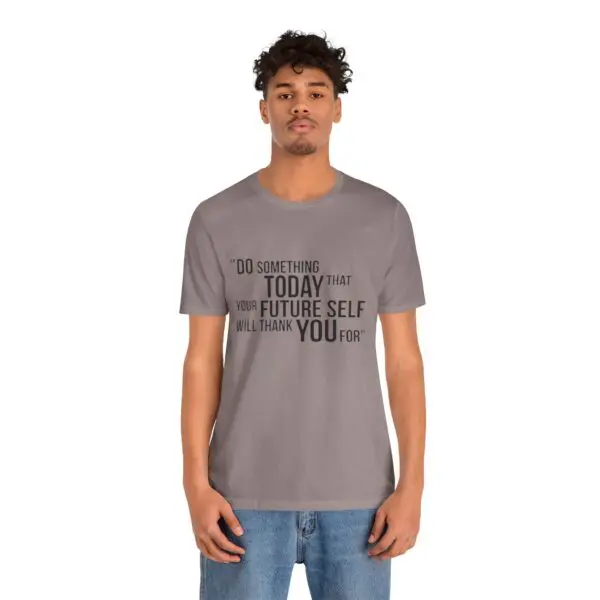 Man wearing motivational quote t-shirt.