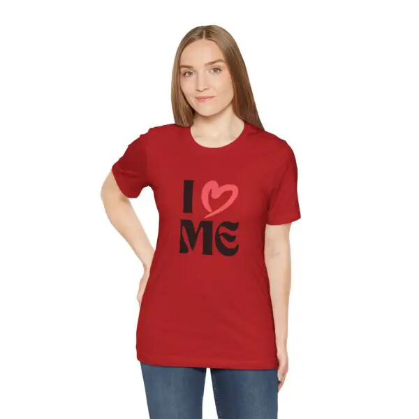 Woman wearing red "I Love Me" shirt.