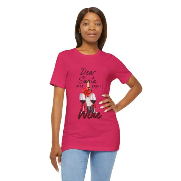 Woman in red "Dear Santa" wine t-shirt.