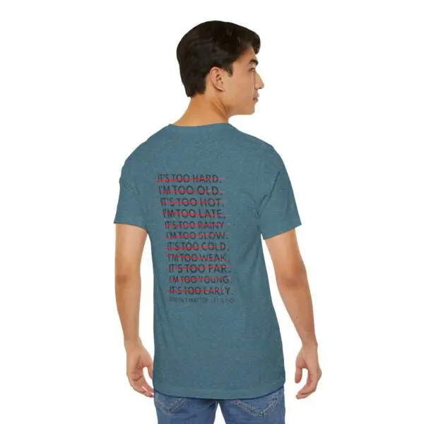 Man wearing a blue motivational T-shirt.