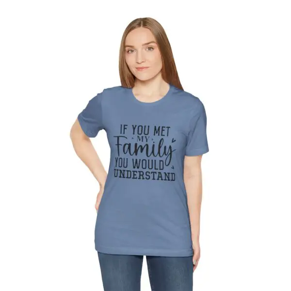 Woman wearing blue shirt with family quote.