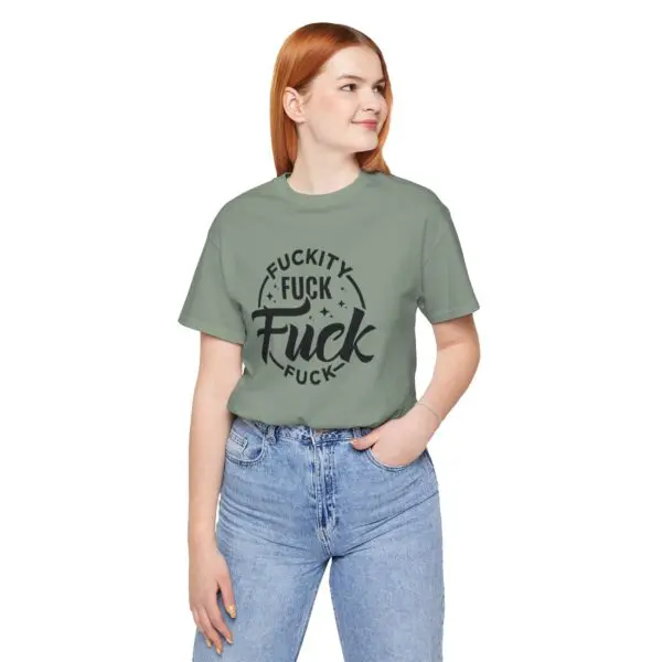Person wearing graphic t-shirt with text.
